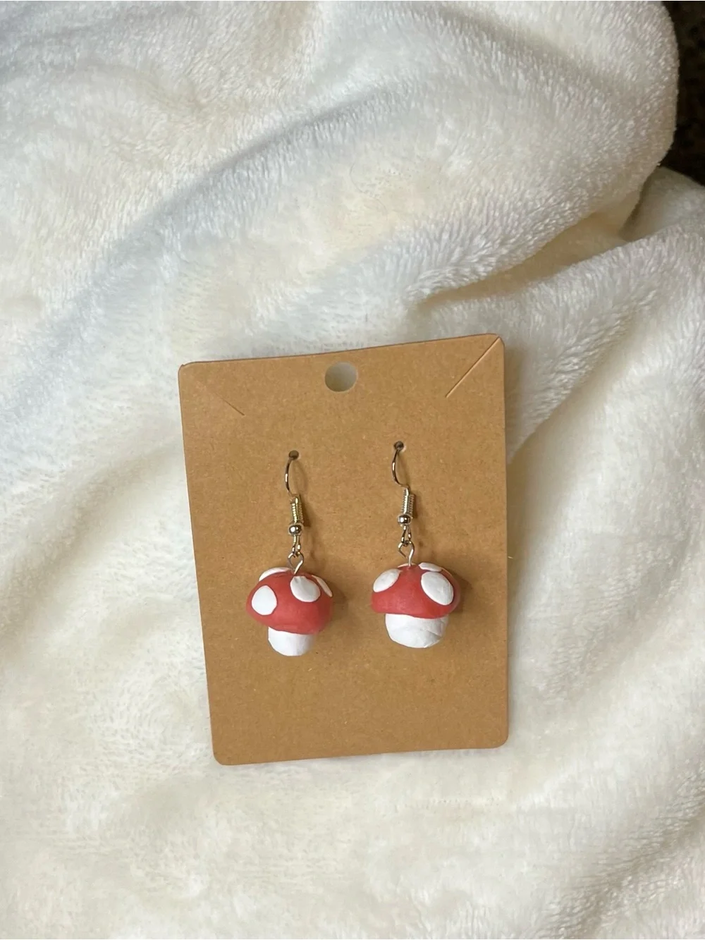 Super Mario-inspired Handcrafted mushroom dangle earrings.